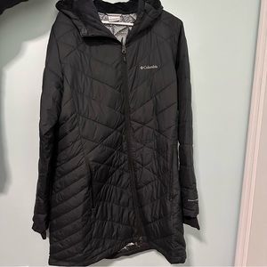 Columbia Omni-Heat.  Very warm, lightweight and NOT BULKY winter jacket.